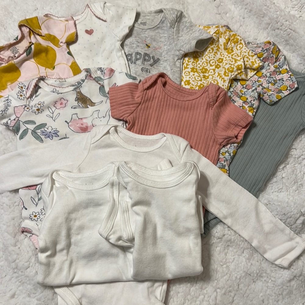 Bundle of newborn onesies